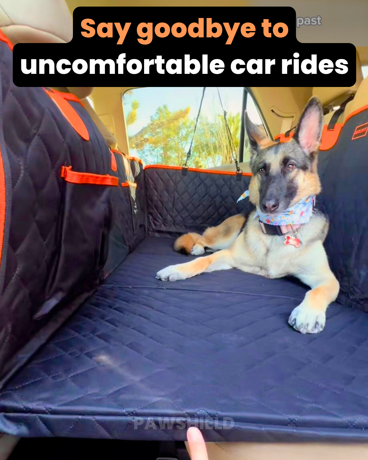 Dog sitting on a car seat cover with text 'Say goodbye to uncomfortable car rides' and 'PAWSHIELD' branding.